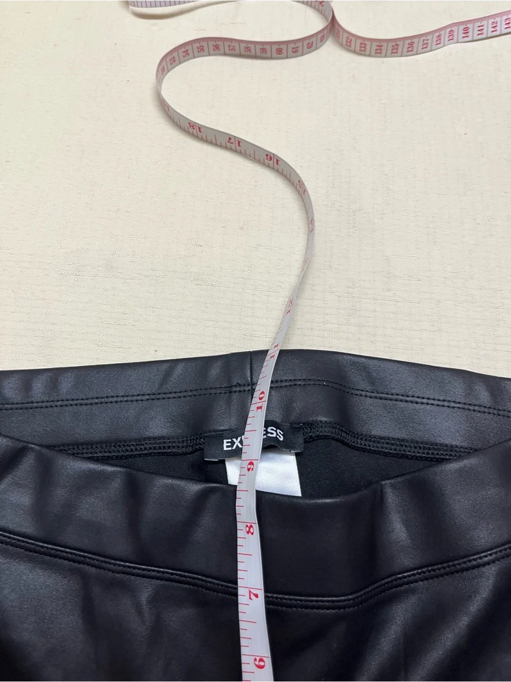 Express M black faux leather leggings